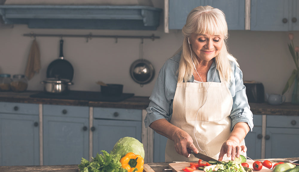 Mature woman preparing fresh food